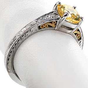 Filigree sapphire engagement rings in Honolulu. This gorgeous antique engagement ring style features hand wrought yellow gold filigree to compliment the yellow sapphire center stone. The band is further detailed with diamonds and hand engraved patterns. 